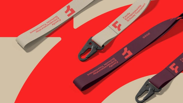 Nyckelband i två färgställningar med fests logotyp